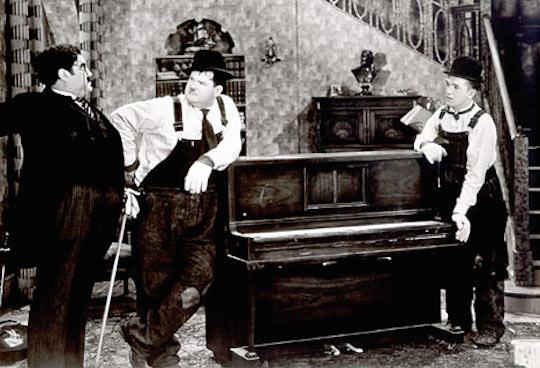 Screenshot from Laurel & Hardy to show how influencing amazon's algorithms is like moving a piano